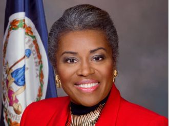 A racist sign targeting Winsome Earle-Sears has sparked condemnation from Virginia leaders.