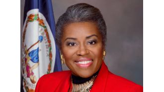 A racist sign targeting Winsome Earle-Sears has sparked condemnation from Virginia leaders.