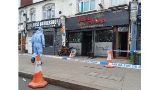 Two suspects, aged 15 and 54, were apprehended for suspected arson at a restaurant in east London.