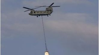 India's space agency successfully tests parachute system for future manned mission, bringing them one step closer to launching humans into space.