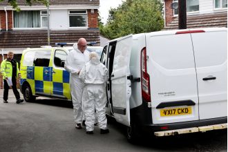 A child woke up to the sounds of their mother's screams as their father fatally stabbed her in bed.