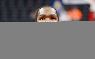 Kevin Durant re-signs with Rockets for $90M, breaking records.