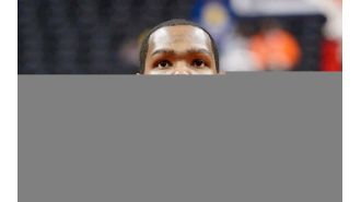 Kevin Durant re-signs with Rockets for $90M, breaking records.