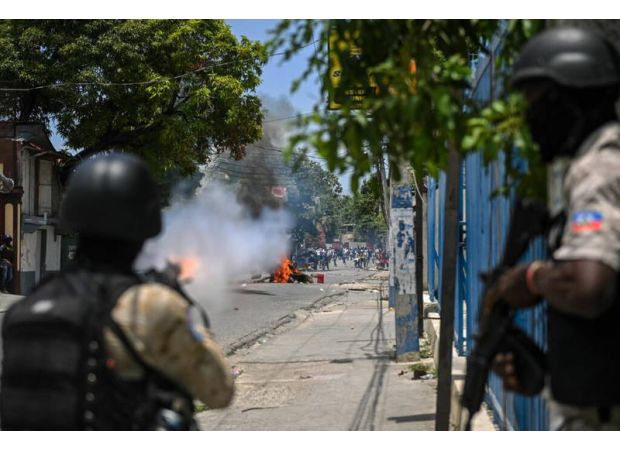 Haitian-American couple overjoyed to bring adopted children home from gang-controlled Port-Au-Prince.