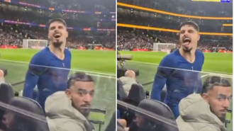 A Chelsea player was caught on camera taunting Tottenham supporters after his team's victory in a heated derby match.