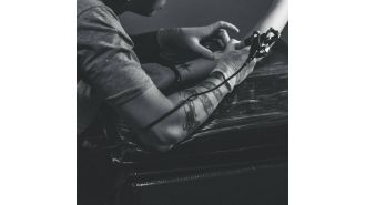 6-year-old designs tattoo for Atlanta artist; unique collaboration results in permanent body art.