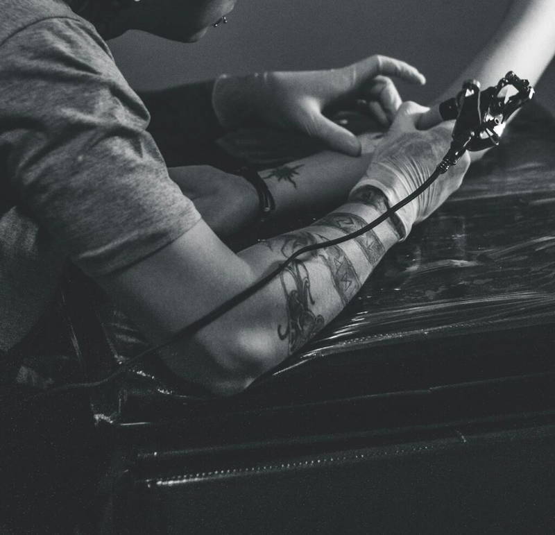 6-year-old designs tattoo for Atlanta artist; unique collaboration results in permanent body art.