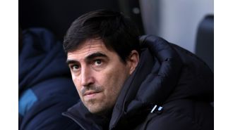 Andoni Iraola addresses speculation of potential move from Bournemouth to Manchester United or Tottenham.