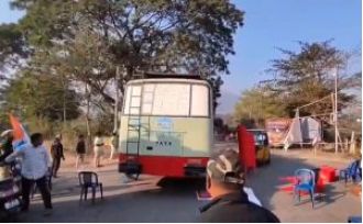 Protesters narrowly escape danger when police bus malfunctions during demonstration.