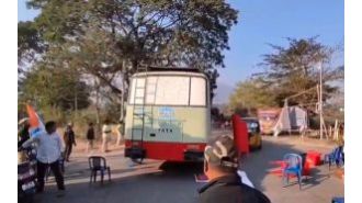 Protesters narrowly escape danger when police bus malfunctions during demonstration.