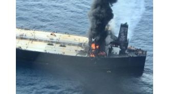 A ship carrying 15 Indian sailors is attacked while traveling near the coast of Oman.