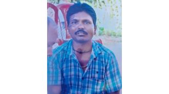 Suspect in triple homicide found on top of water tank.