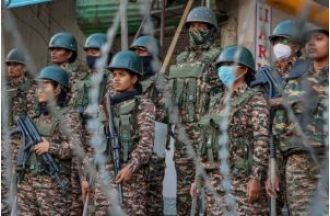 Police and protesters clash at Manipur torch rally.