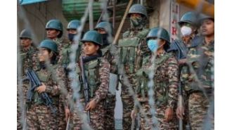 Police and protesters clash at Manipur torch rally.