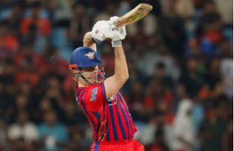 In a rain-interrupted match, Marsh's century leads LSG to a score of 209/3 against RCB in IPL 2026.