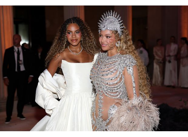 Beyoncé and her daughter Blue Ivy defy convention by attending the Met Gala, marking the singer's return to the event.