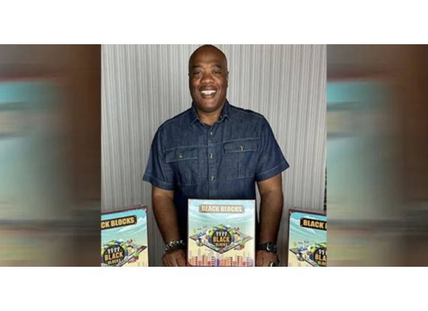 David E. Rogers creates 'Black Blocks,' a game that uses Black history to teach money management skills.