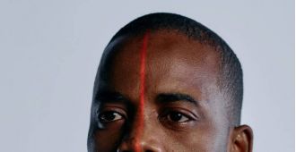 Model from Nigeria and Australia claims that artificial intelligence technology made his skin and eyes appear lighter in a recent menswear campaign.