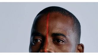 Model from Nigeria and Australia claims that artificial intelligence technology made his skin and eyes appear lighter in a recent menswear campaign.