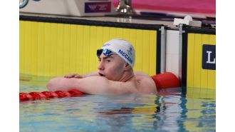 Parents support Sean McCann at Commonwealth Games.