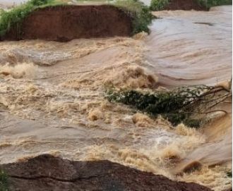 Thousands stranded by river breaches.