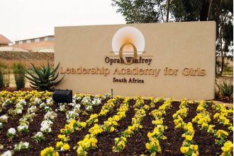 Oprah Winfrey will shut down her South Africa girls' school and increase scholarship opportunities.