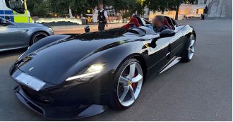 Police officer gets a ride around Mayfair in a seized rare Ferrari.