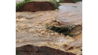 Thousands stranded by river breaches.