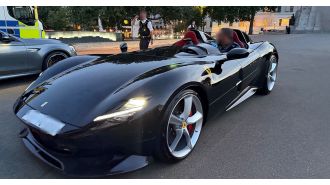 Police officer gets a ride around Mayfair in a seized rare Ferrari.