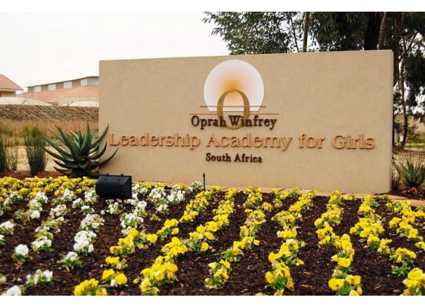Oprah Winfrey will shut down her South Africa girls' school and increase scholarship opportunities.
