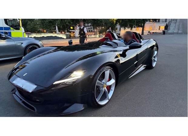 Police officer gets a ride around Mayfair in a seized rare Ferrari.