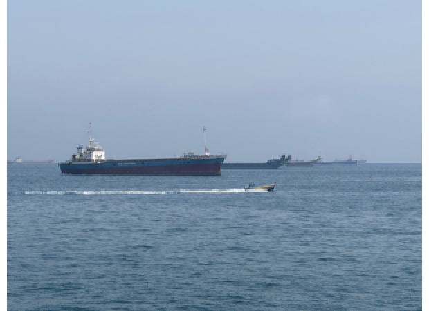 Two oil tankers from UAE struck while passing through Hormuz, according to a report.