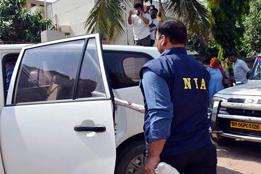 NIA officials seize car and bike
